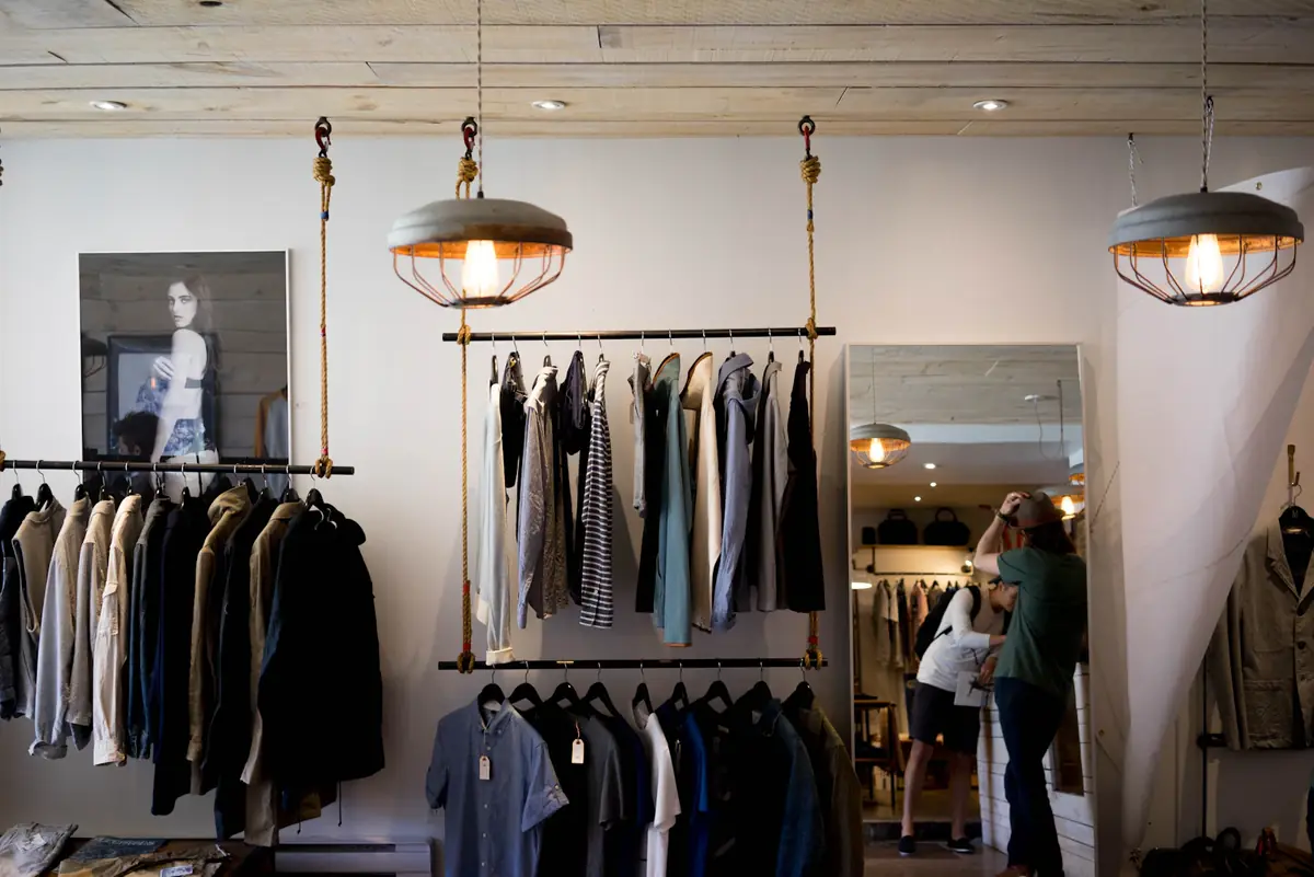 Showroom racks and a fitting mirror